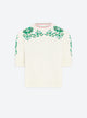 knit top with hand-embroidered flowers