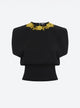 Knit top with hand-embroidered details
