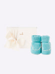 Baby slippers with crochet finishes