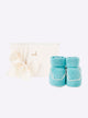 Baby slippers with crochet finishes