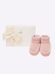 Baby slippers with crochet finishes