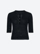 top in a delicate crochet knit
