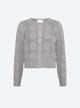 Cardigan with clover motifs