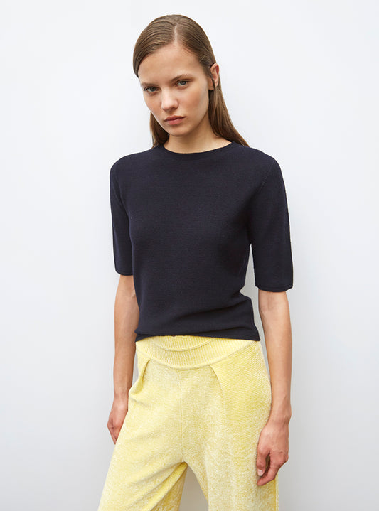 fine top with elbow-length sleeves