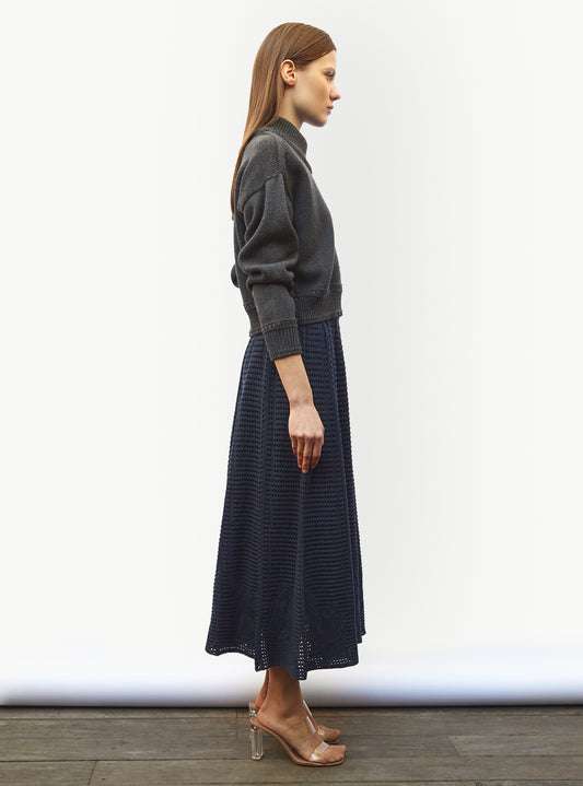 short sweater with braided finishes
