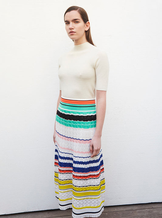 fine top with fitted, high collar