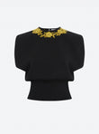 Knit top with hand-embroidered details