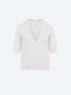 V-necked top in smocked knit