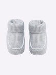 Baby slippers with crochet finishes