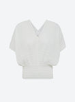 Couture top in an organza knit