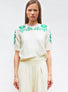 knit top with hand-embroidered flowers