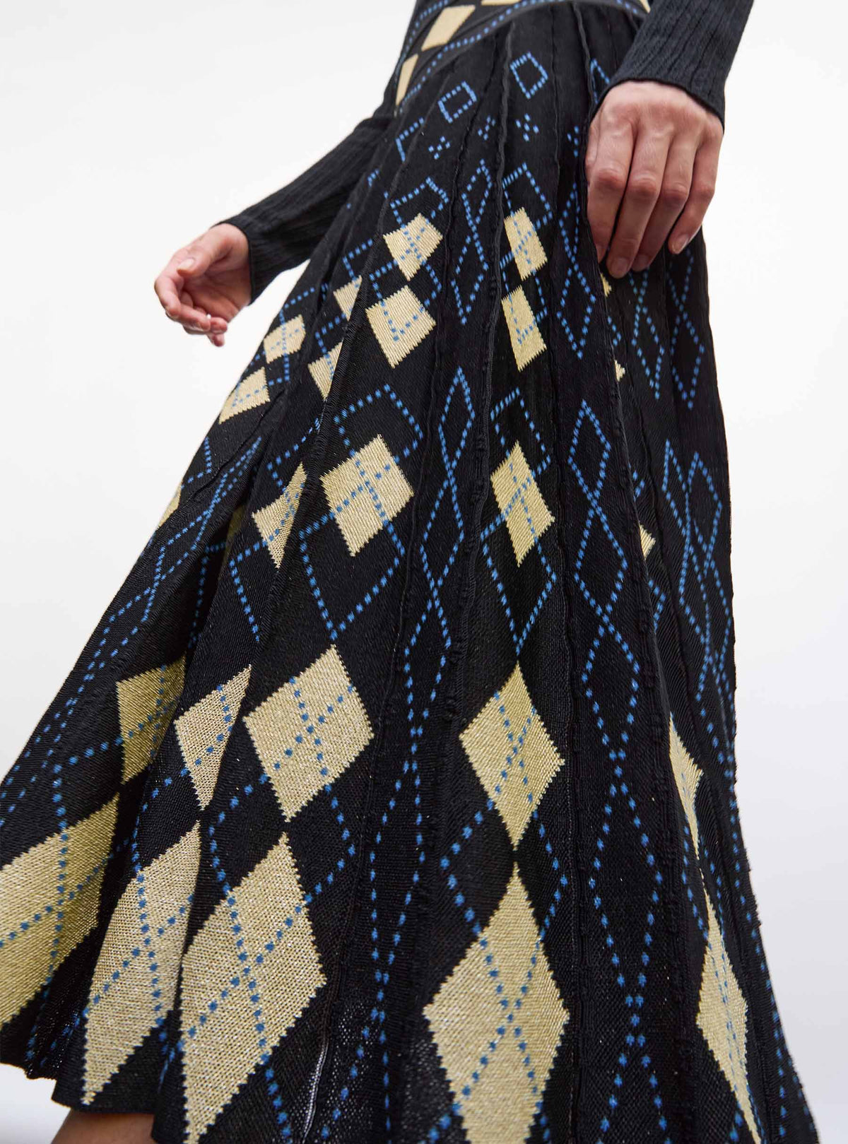 Jupe en maille de luxe Molli - Jupe fluide maille argyle noir profond-multi