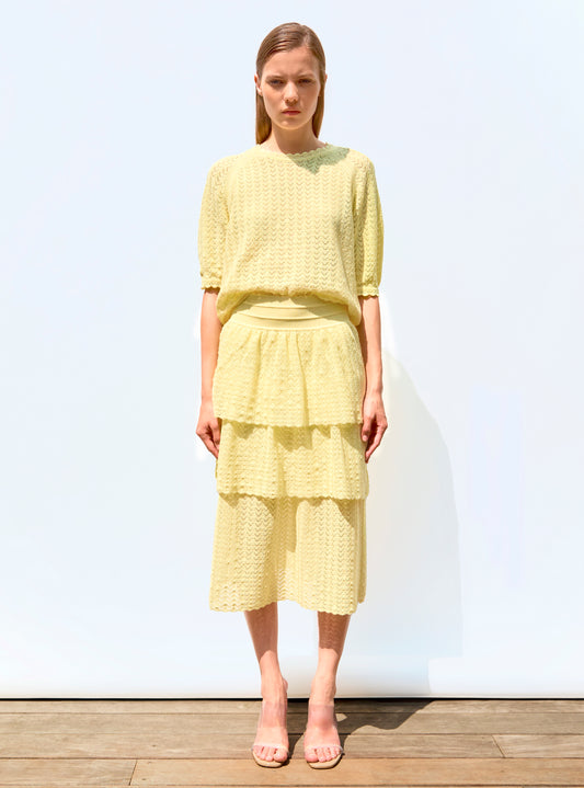 elbow-length-sleeved top in a pointelle knit