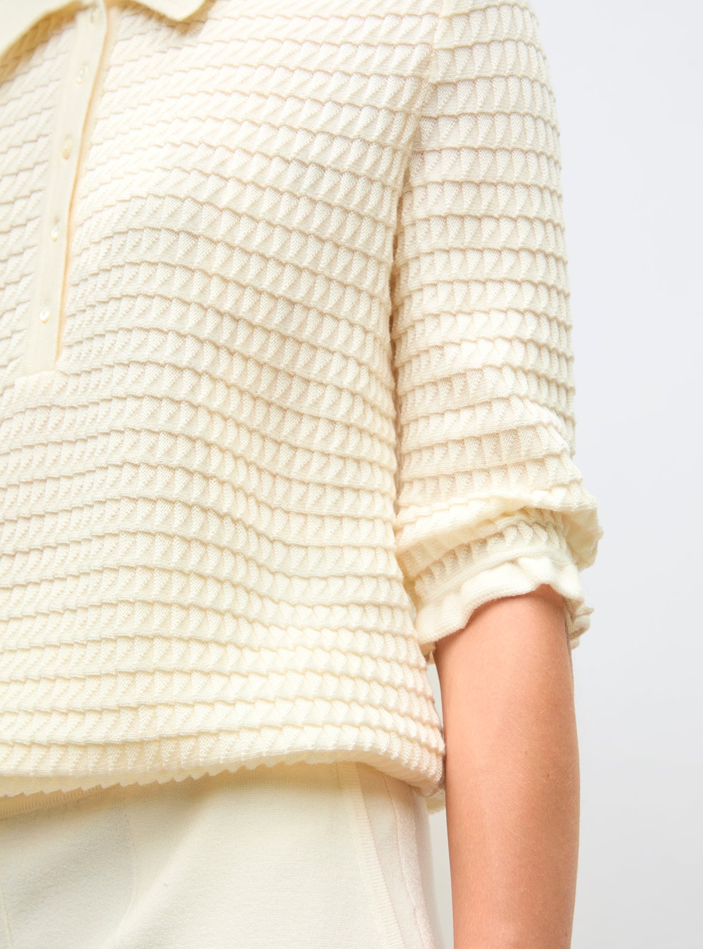 polo in an origami knit