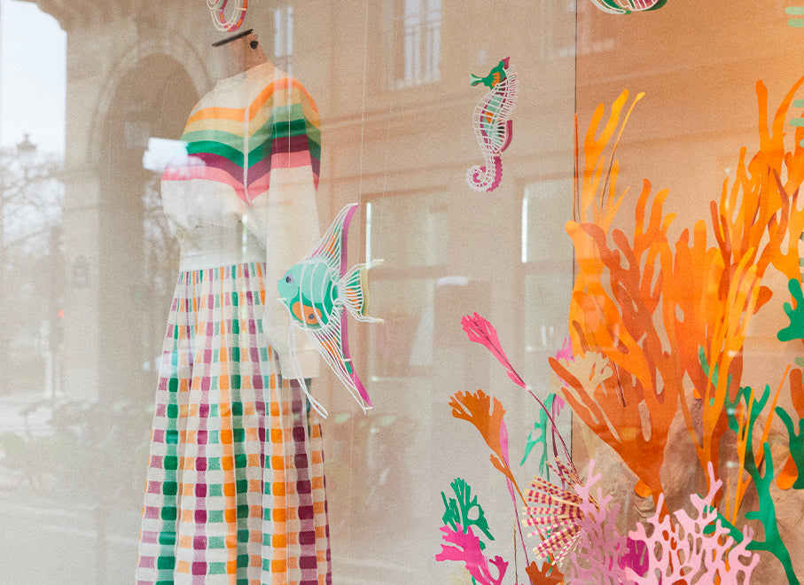 vêtement en maille luxe Molli vitrine boutique 