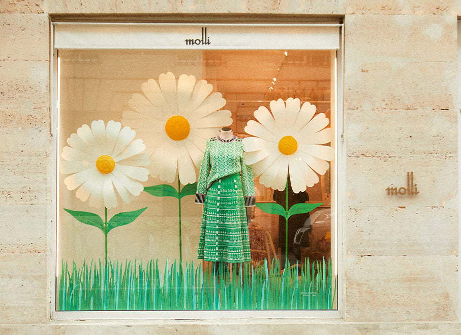 robe en maille fine verte en vitrine boutique