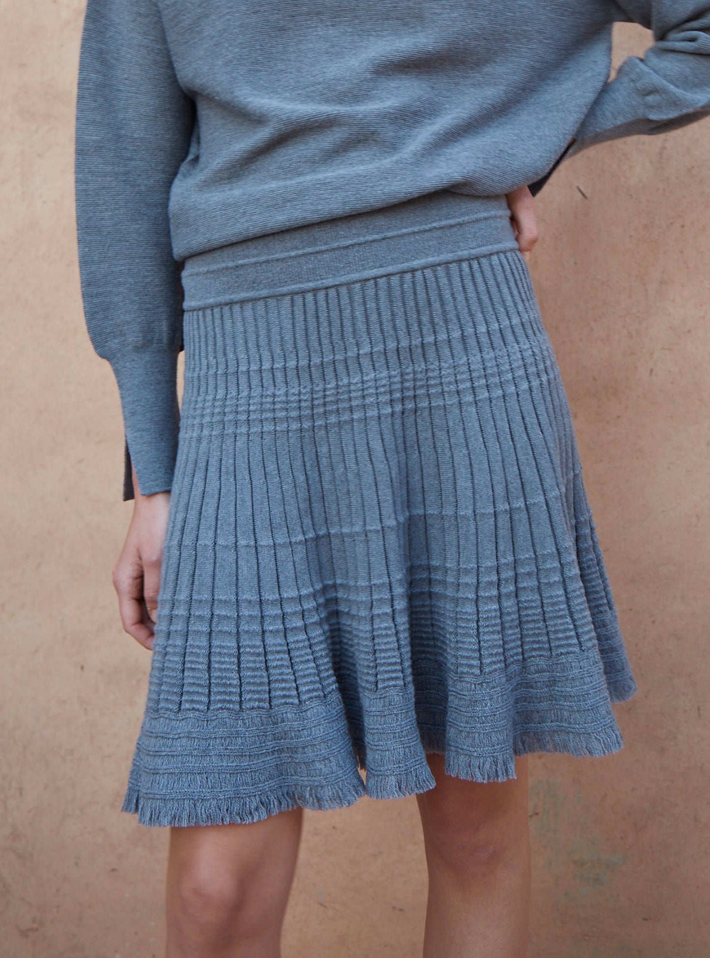 Jupes de luxe femme - Jupe courte en maille à frange